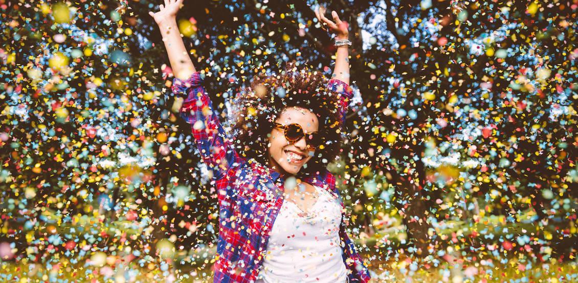 Hipster enjoying confetti