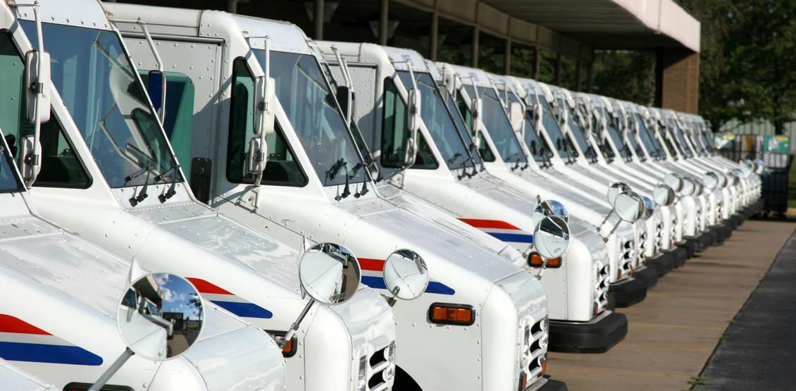 Postal delivery trucks