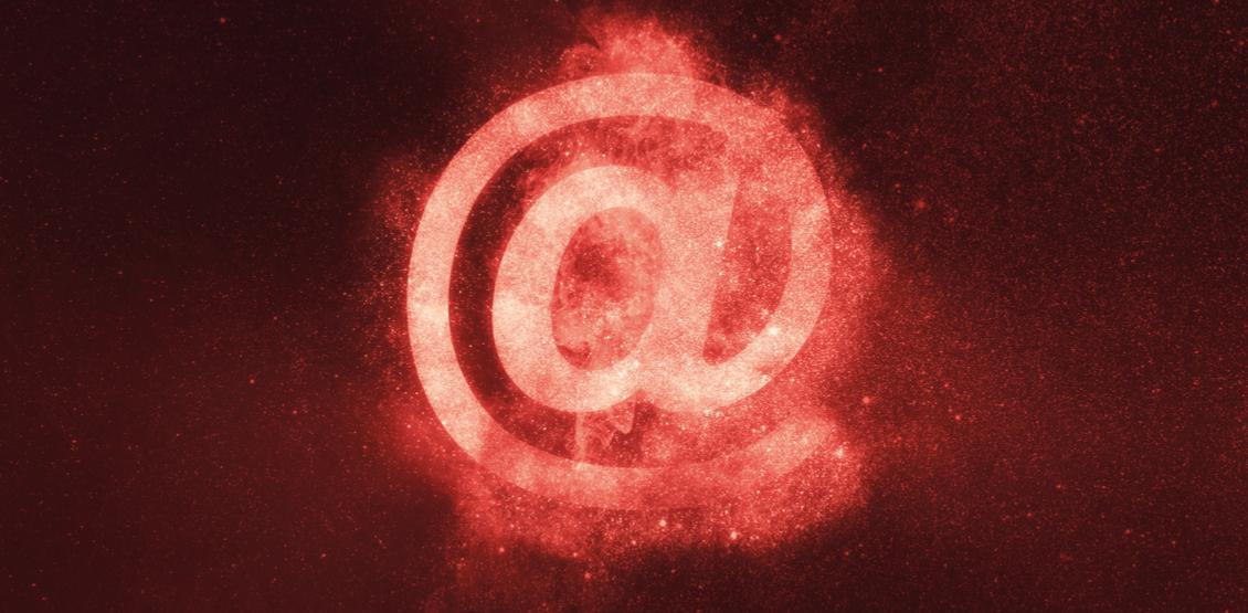 Photo of @ symbol on a red background