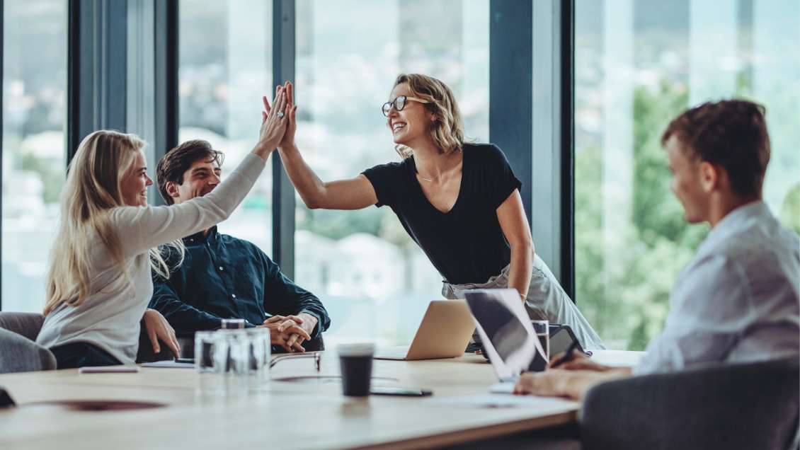 group-of-colleagues-celebrating-success-picture-id1347652268